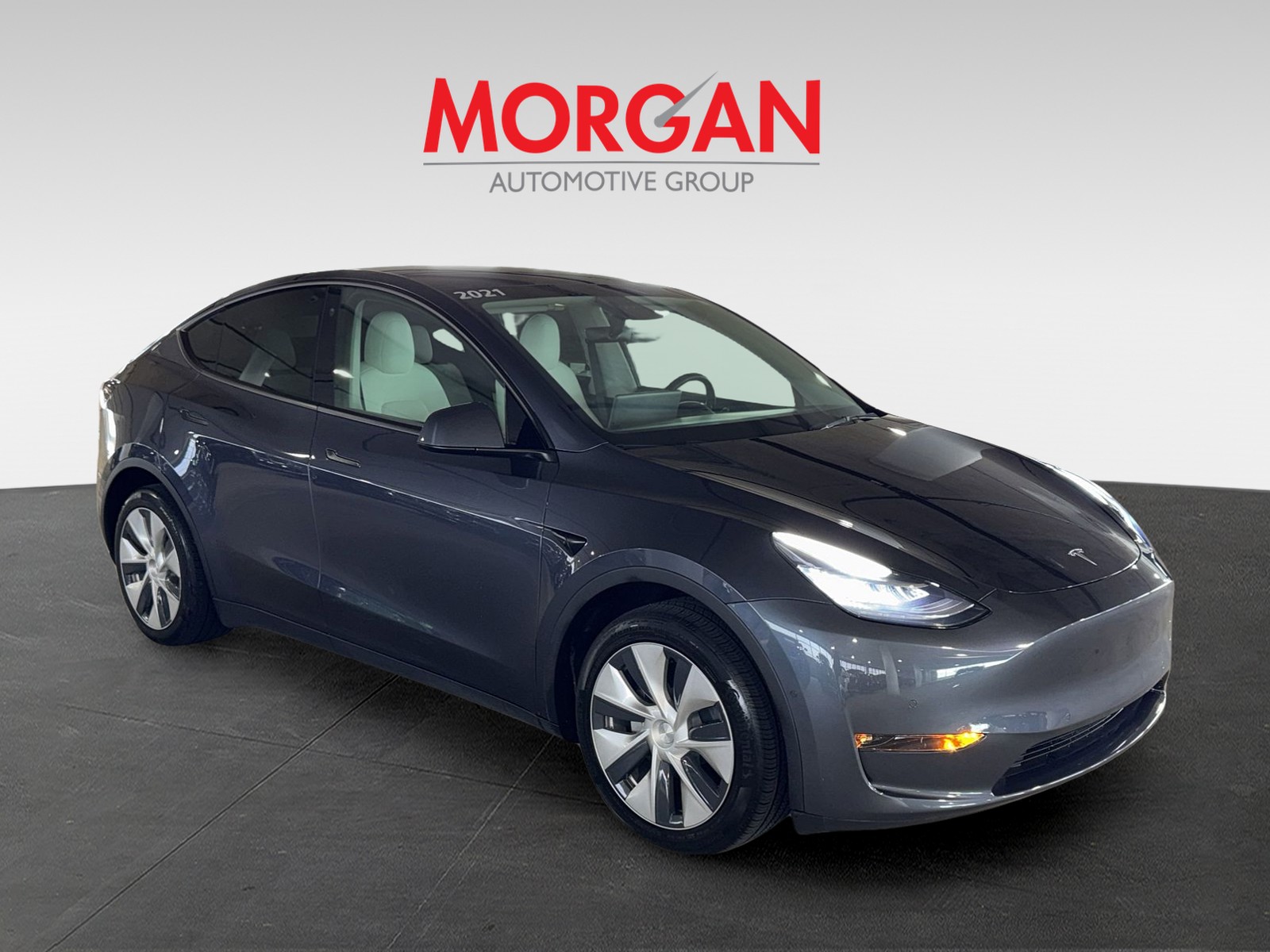 Used 2021 Tesla Model Y Long Range with VIN 5YJYGDEE8MF256887 for sale in Kansas City