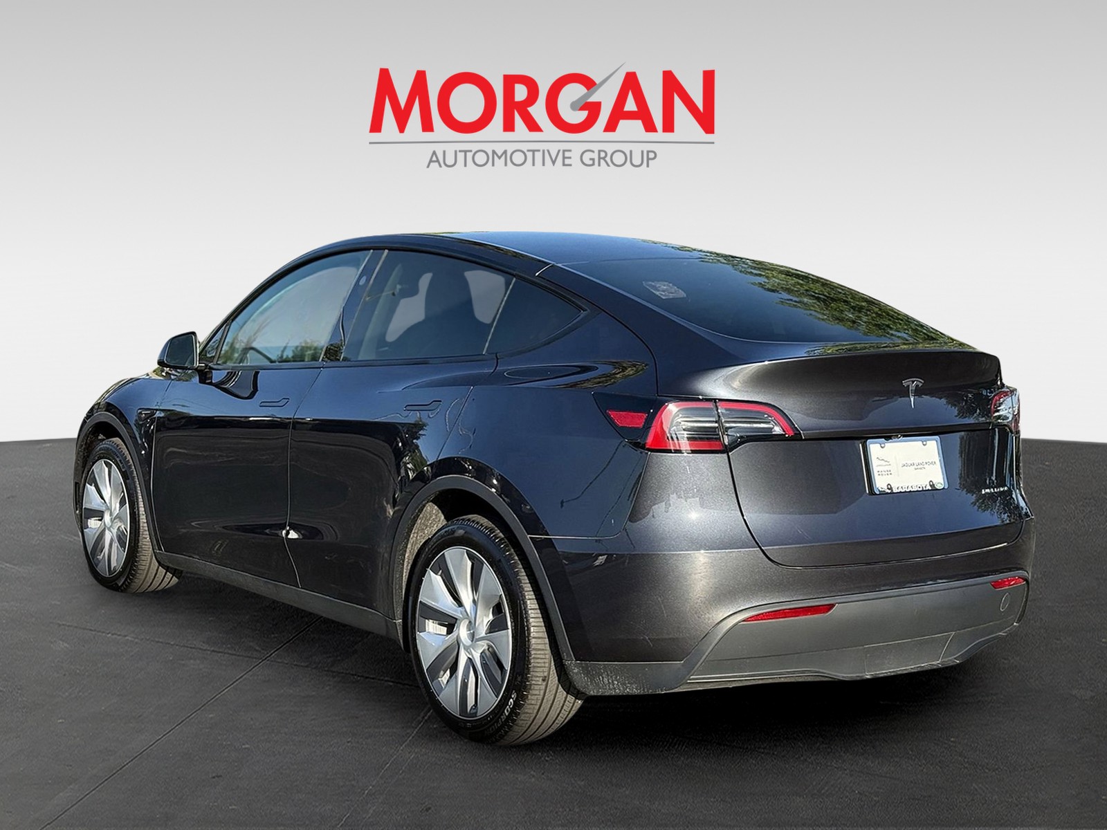 Used 2024 Tesla Model Y Long Range with VIN 7SAYGDEE4RA245411 for sale in Tampa, FL